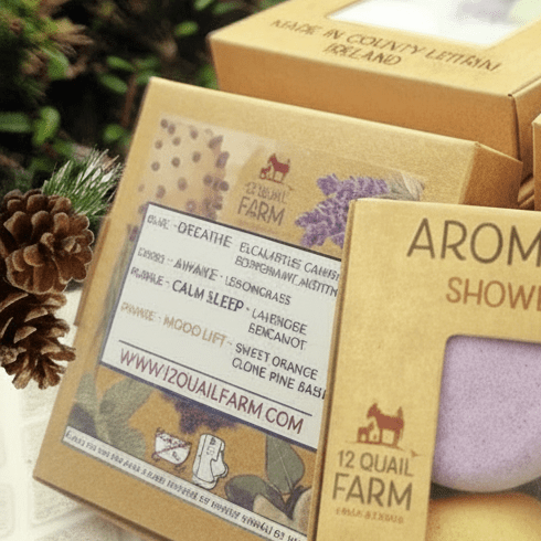 12 Quail Farm aromatherapy product packaging with a label and visible branding.