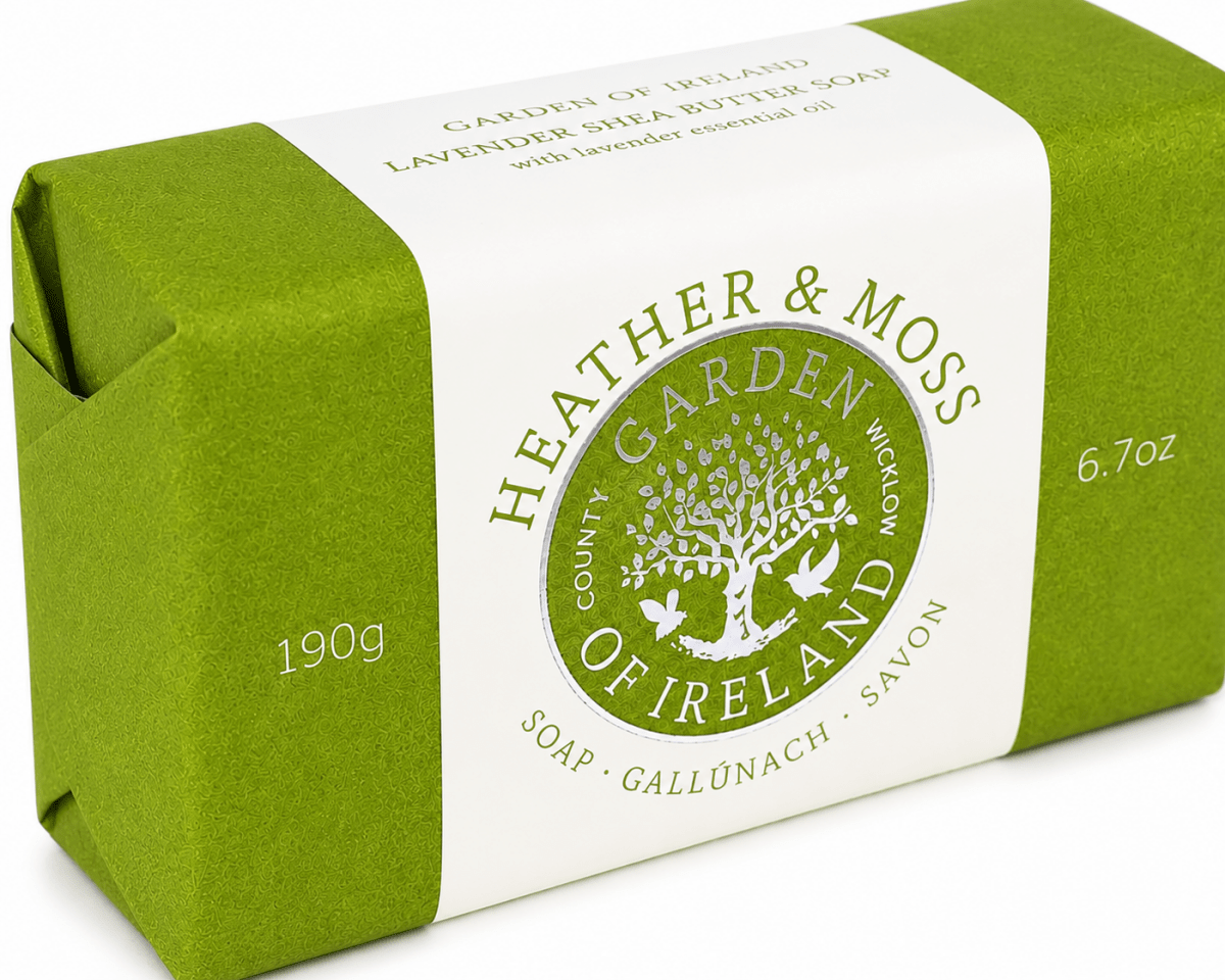 Green and white soap packaging with 'Heather & Moss' branding on a white background
