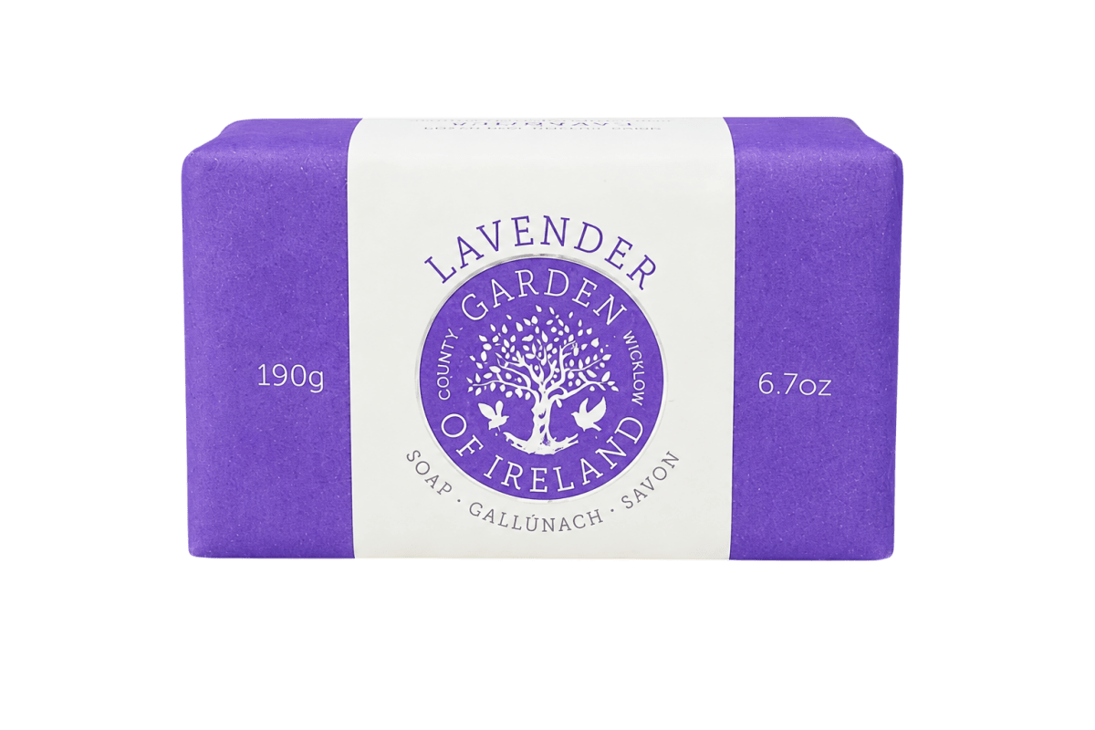 Bar of soap with a purple and white label on a white background