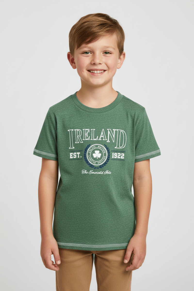 Child wearing green Ireland Collegiate T-shirt with Celtic shamrock crest, EST 1922, The Emerald Isle.