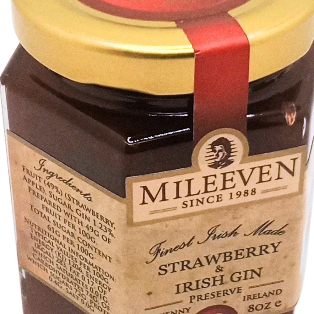 Jar of Mileeven Strawberry & Irish Gin Preserve with a red ribbon