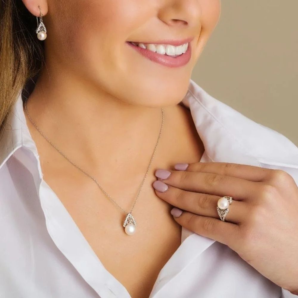 Sterling Silver Trinity Knot Capped Pearl Necklace