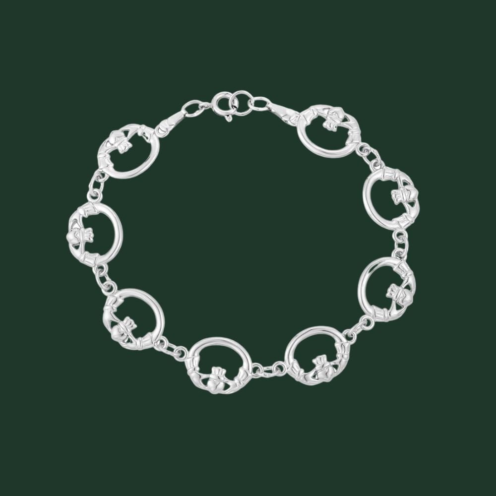 Tara Silver Claddagh bracelet with rhodium-plated circular links and Claddagh motifs.