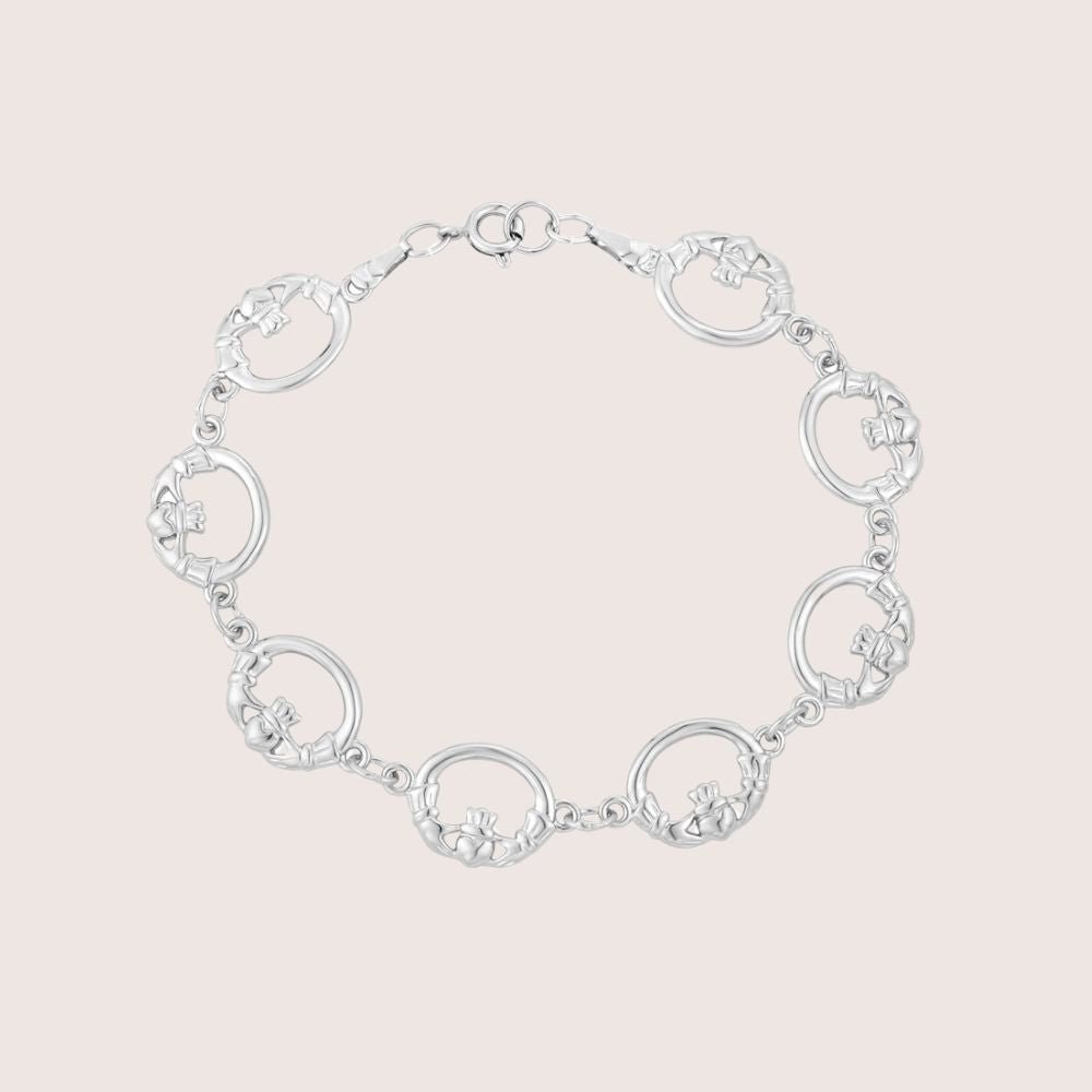 Tara Silver Claddagh bracelet with rhodium-plated circular links and Claddagh motifs.