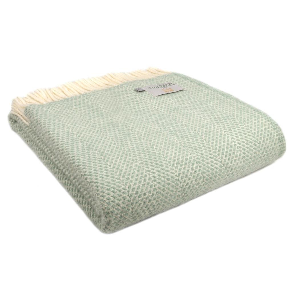 Tweedmill Beehive Ocean wool throw folded, beehive weave in ocean blue-green with cream fringe.